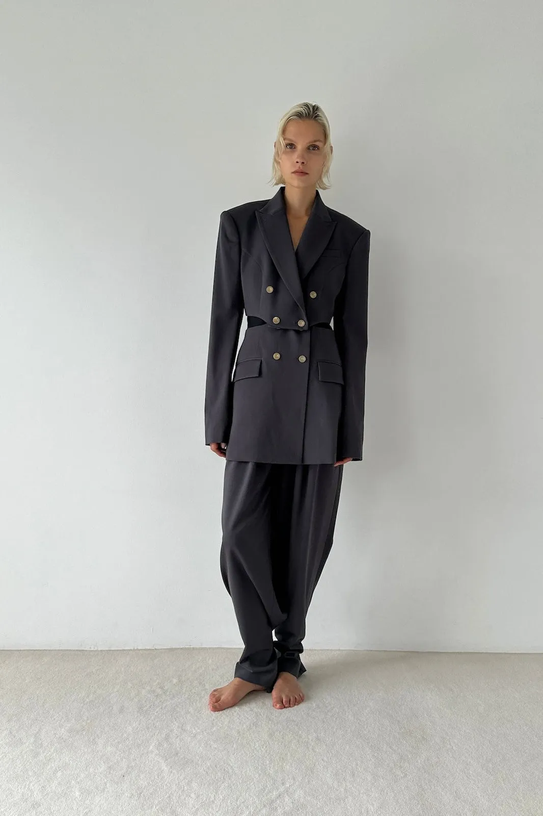 HIGH-WAIST PLEATED TROUSERS