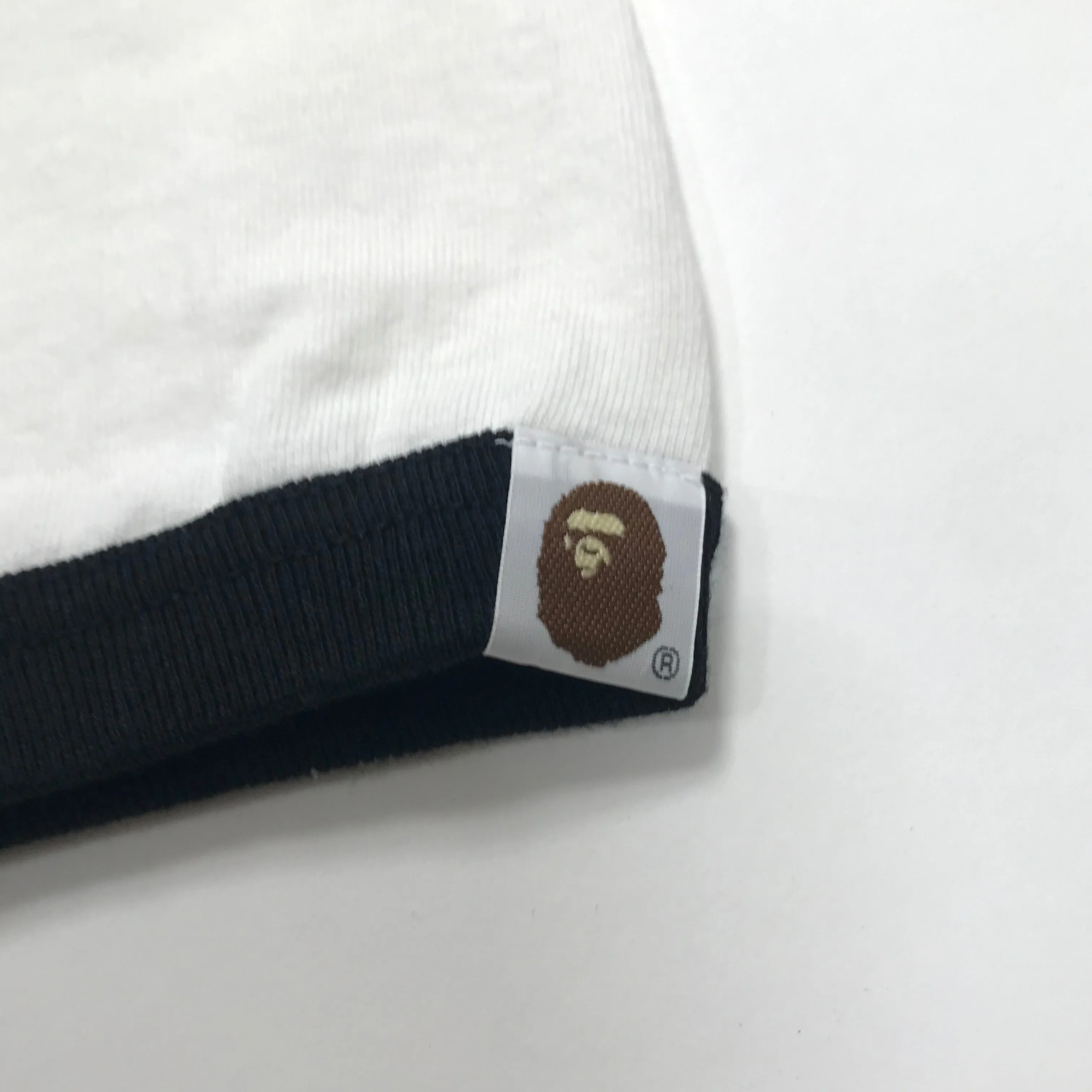 [S] A Bathing Ape Bape x Kaws Logo Ringer L/S Tee White